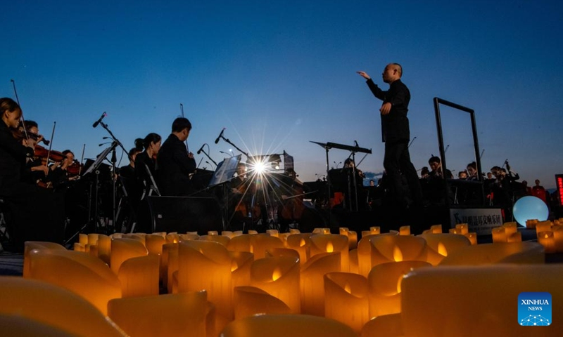 Artists perform during the opening ceremony of the 7th Nie Er Music Week held at Dianchi Lake in Kunming, southwest China's Yunnan Province, July 17, 2023. This year's Nie Er Music Week, which is being held in the name of Nie Er (1912-1935), the composer of China's national anthem, will be held in Yunnan's Kunming and Yuxi from July 17 to 23.(Photo: Xinhua)