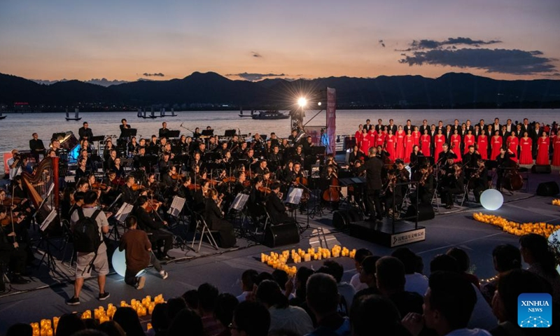 Artists perform during the opening ceremony of the 7th Nie Er Music Week held at Dianchi Lake in Kunming, southwest China's Yunnan Province, July 17, 2023. This year's Nie Er Music Week, which is being held in the name of Nie Er (1912-1935), the composer of China's national anthem, will be held in Yunnan's Kunming and Yuxi from July 17 to 23.(Photo: Xinhua)