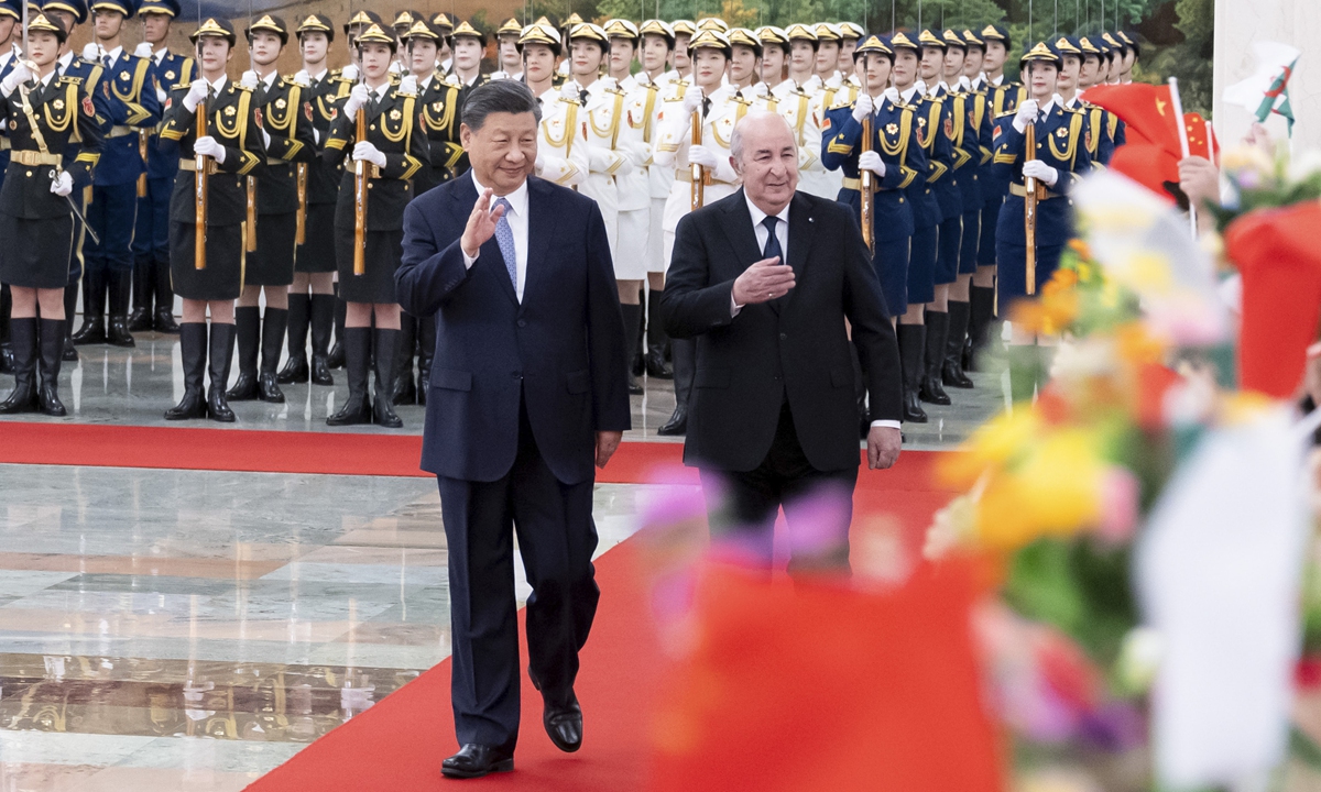 Chinese President Xi Jinping (left) and Algerian President Abdelmadjid Tebboune at a welcoming ceremony at the North Hall of the Great Hall of the People in Beijing on July 18, 2023 Photo:Xinhua