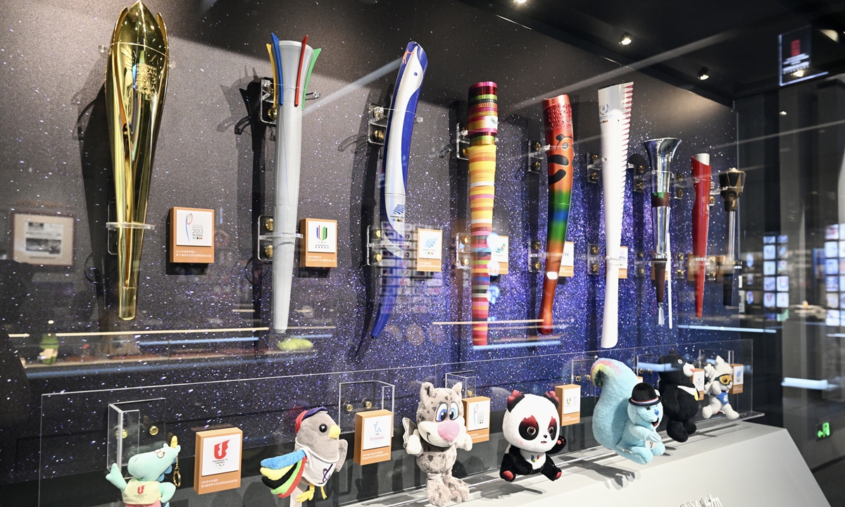 A display case showcases the torches and mascots of the upcoming and former World University Games at the Chengdu FISU World University Games Museum in Chengdu, Southwest China's Sichuan Province on July 24, 2023. Photo: VCG