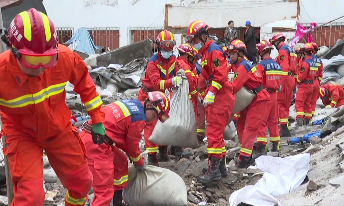 Firefighters in rescue operation at the site where the roof of a school gymnasium collapsed, in Qiqihar city, Northeast China's Heilongjiang Province, on July 24, 2023.?Photo: VCG