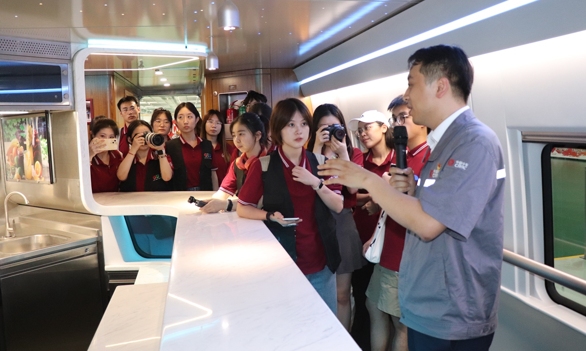 Liu introduces visitors to the EMU's kitchen on July 22, 2023. Photo: Chen Yang 