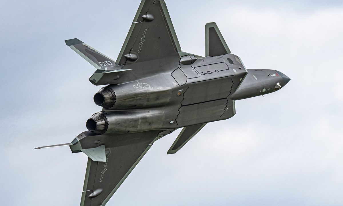 A J-20 stealth fighter jet delivers flight performances during the Air Force open-day event held in Changchun, Northeast China's Jilin Province on August 26, 2022.