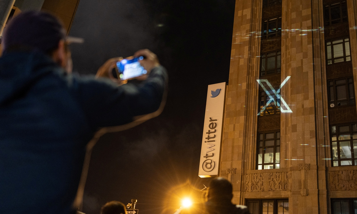 Twitter's new logo is seen projected on the company's corporate headquarters building in downtown San Francisco, California on July 23, 2023. On the same day, Elon Musk unveiled a logo for the social media platform featuring a white X on a black background to replace the familiar blue bird symbol. Photo: IC