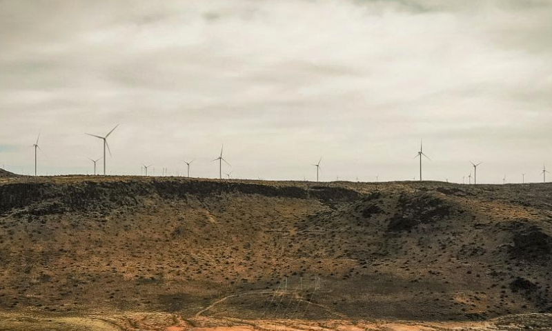 This photo taken on July 25, 2023 shows wind turbines of the De Aar wind power project in De Aar, South Africa.

The installed capacity of the De Aar wind power project invested by China's Longyuan Power and its South African partners is 244.5 megawatts (MW), which can stably supply clean power of about 760 gigawatt hour (GWh) annually, equivalent to saving more than 200,000 metric tons of standard coal, reducing carbon dioxide emissions of 700,000 metric tons. (Photo by Yeshiel Panchia/Xinhua)