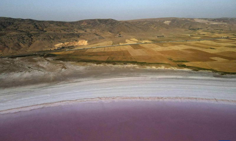 This aerial photo taken on July 27, 2023 shows a view of Tuz Golu in Türkiye. Tuz Golu featuring vibrant pink color is a salt lake in Türkiye. (Mustafa Kaya/Handout via Xinhua)