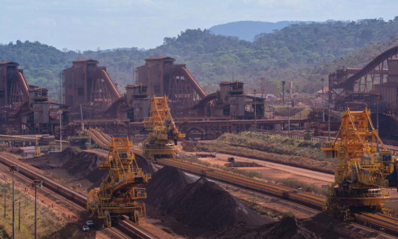 This aerial photo taken on Aug. 3, 2023 shows machinery working at the Carajas Mine, one of the world's largest iron ore mines, in the state of Para in Brazil. (Xinhua/Wang Tiancong)