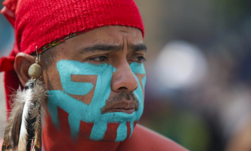 A dancer performs during the celebration for the 698th anniversary of the foundation of Tenochtitlan at Zocalo square in Mexico City, Mexico, July 26, 2023. (Photo by Francisco Canedo/Xinhua)