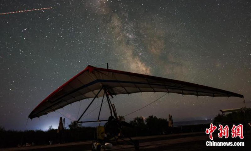 Starry night sky with Milk Way over Nalati National Wetland forms a fantasy landscape in northwest China's Xinjiang Uygur Autonomous Region, July 24, 2023. (Photo: China News Service/Zhang Wenting)