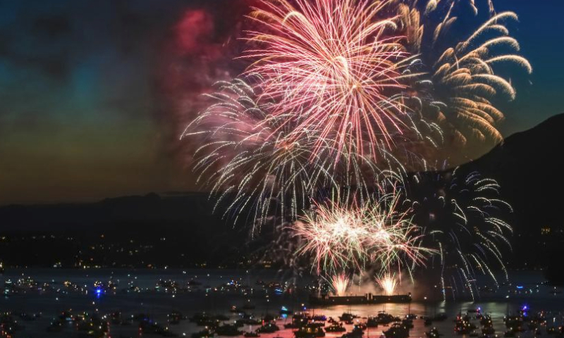 Fireworks presented by team Philippines light up the sky at English Bay in Vancouver, British Columbia, Canada, July 29, 2023. The fireworks show marked the final fireworks performance of the 31st Celebration of Light fireworks competition. (Photo by Liang Sen/Xinhua)