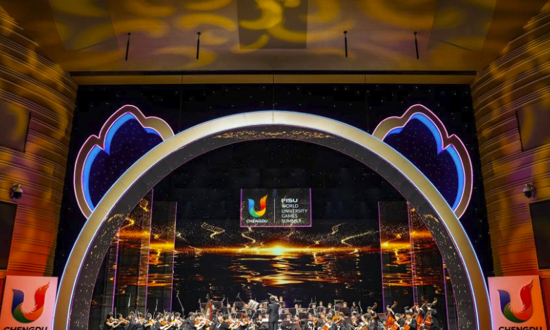 Musicians play during the concert Dreams of Midsummer at the 31st FISU Summer World University Games Village in Chengdu, southwest China's Sichuan Province, July 30, 2023. (Xinhua/Shen Bohan)