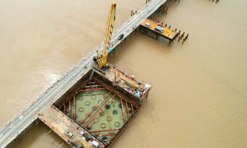 This aerial photo taken on July 31, 2023 shows the construction site of the main bridge of a super major bridge across the Yellow River along the Xiong'an-Shangqiu high-speed railway, in Taiqian County, central China's Henan Province. The super major bridge, with the main bridge of 1,600-meter long, will cross the section of the Yellow River that separates Taiqian County in Henan Province and Liangshan County in east China's Shandong Province.

The 552-kilometer-long Xiong'an-Shangqiu high-speed railway, for its part, will connect Xiong'an in north China's Hebei Province and Shangqiu in Henan, and will allow a train to run at 350 kilometers per hour on it. (Xinhua/Zhu Xiang)