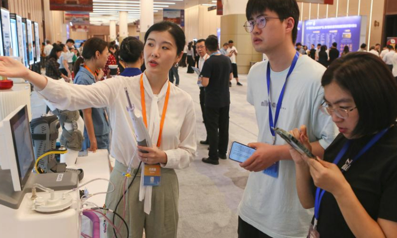 Journalists work at a match-making event of the 6th China International Import Expo (CIIE) at the National Exhibition and Convention Center (Shanghai) in east China's Shanghai, July 26, 2023.

The 6th CIIE is scheduled to be held in Shanghai from Nov. 5 to 10. It will resume offline Country Exhibition this year. (Xinhua/Xin Mengchen)