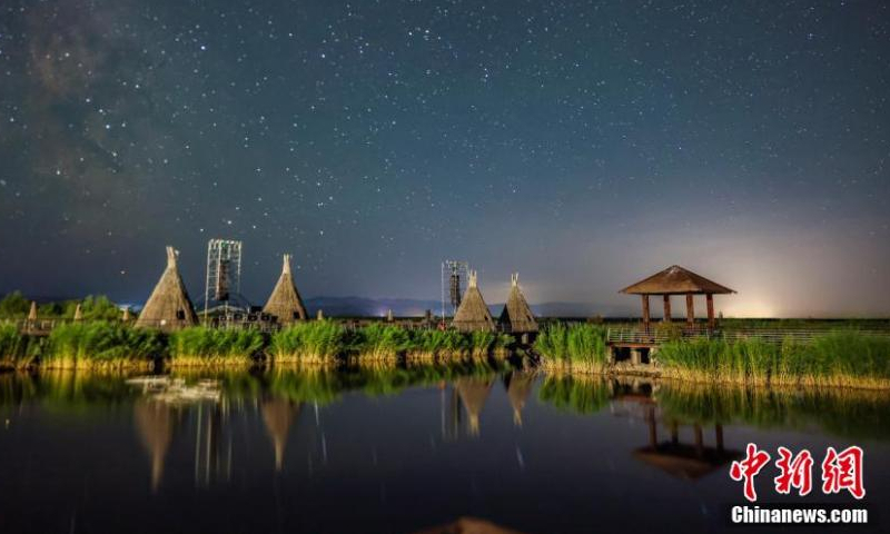 Starry night sky with Milk Way over Nalati National Wetland forms a fantasy landscape in northwest China's Xinjiang Uygur Autonomous Region, July 24, 2023. (Photo: China News Service/Zhang Wenting)