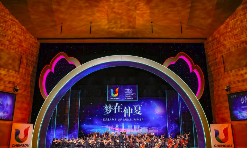 Musicians play during the concert Dreams of Midsummer at the 31st FISU Summer World University Games Village in Chengdu, southwest China's Sichuan Province, July 30, 2023. (Xinhua/Shen Bohan)