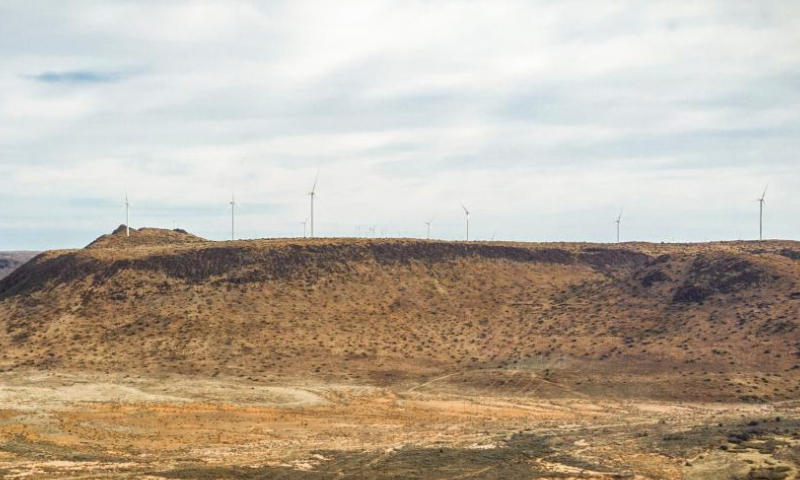 This photo taken on July 25, 2023 shows wind turbines of the De Aar wind power project in De Aar, South Africa. The installed capacity of the De Aar wind power project invested by China's Longyuan Power and its South African partners is 244.5 megawatts (MW), which can stably supply clean power of about 760 gigawatt hour (GWh) annually, equivalent to saving more than 200,000 metric tons of standard coal, reducing carbon dioxide emissions of 700,000 metric tons. (Photo by Yeshiel Panchia/Xinhua)