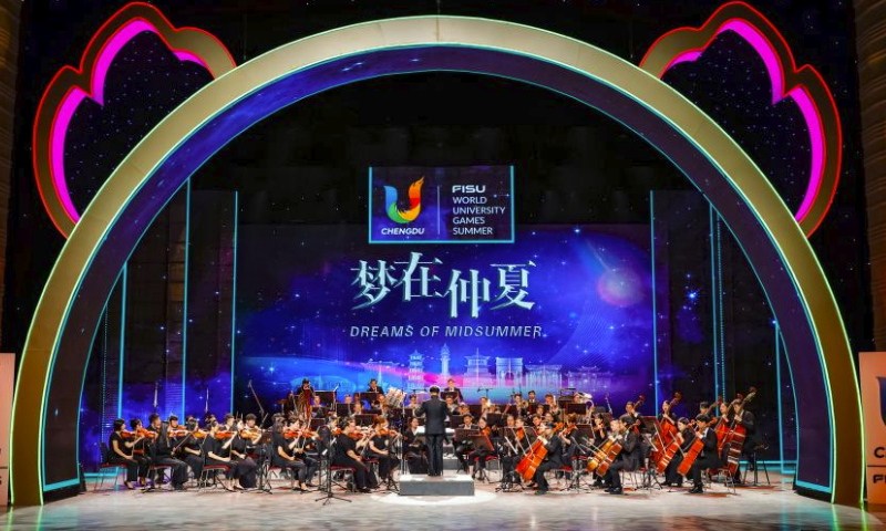 Musicians play during the concert Dreams of Midsummer at the 31st FISU Summer World University Games Village in Chengdu, southwest China's Sichuan Province, July 30, 2023. (Xinhua/Shen Bohan)