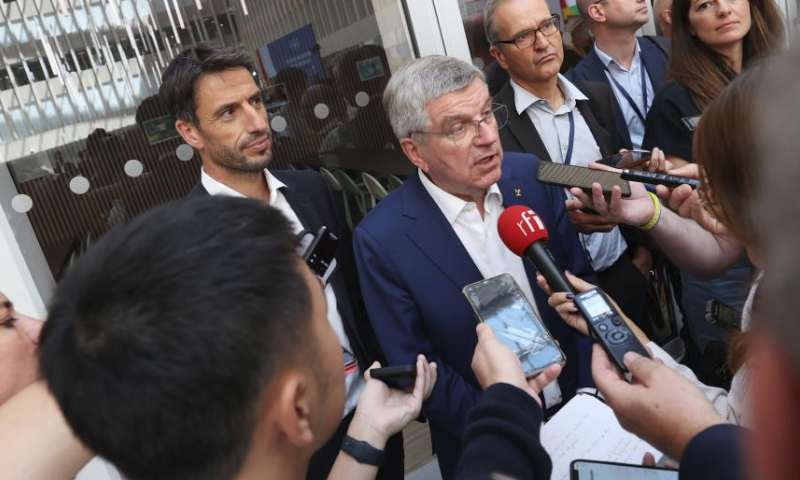 Thomas Bach, President of International Olympic Committee (IOC), gets interviewed after a ceremony marking one year until the opening ceremony of the Paris Olympics in Saint-Denis, near Paris, France, July 26, 2023. (Xinhua/Gao Jing)