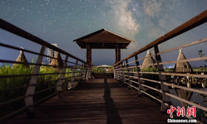 Starry night sky with Milk Way over Nalati National Wetland forms a fantasy landscape in northwest China's Xinjiang Uygur Autonomous Region, July 24, 2023. (Photo: China News Service/Zhang Wenting)