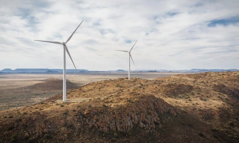 This photo taken on July 25, 2023 shows wind turbines of the De Aar wind power project in De Aar, South Africa.

The installed capacity of the De Aar wind power project invested by China's Longyuan Power and its South African partners is 244.5 megawatts (MW), which can stably supply clean power of about 760 gigawatt hour (GWh) annually, equivalent to saving more than 200,000 metric tons of standard coal, reducing carbon dioxide emissions of 700,000 metric tons. (Photo by Yeshiel Panchia/Xinhua)