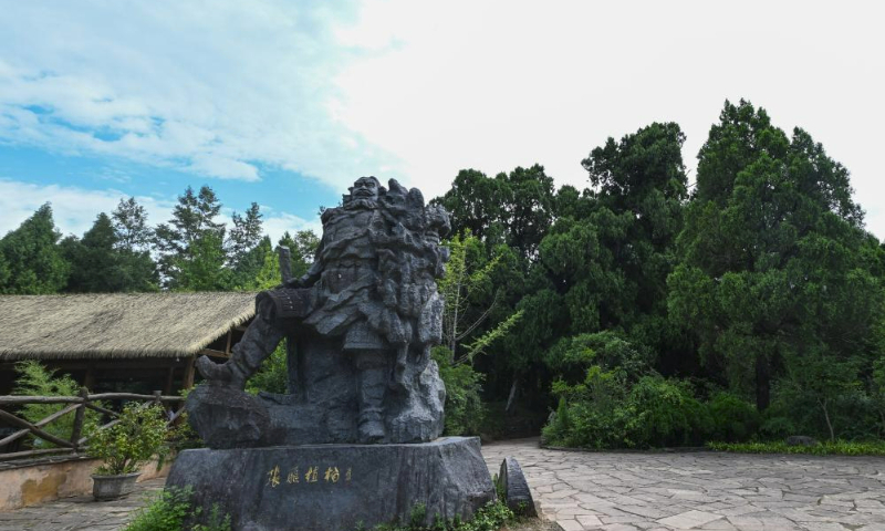 This photo taken on July 24, 2023 shows a statue with a theme of ancient cypress trees in the Cuiyunlang section of an ancient road system known as Shudao in Jiange County of Guangyuan City, southwest China's Sichuan Province. The ancient cypress trees along the Cuiyunlang section of Shudao boast an average age of 1,050 years, with the oldest tree dating back approximately 2,300 years.
Presently, the Cuiyunlang section proudly harbors 7,803 ancient trees, with a staggering 7,778 being ancient cypress trees. (Xinhua/Wang Xi)