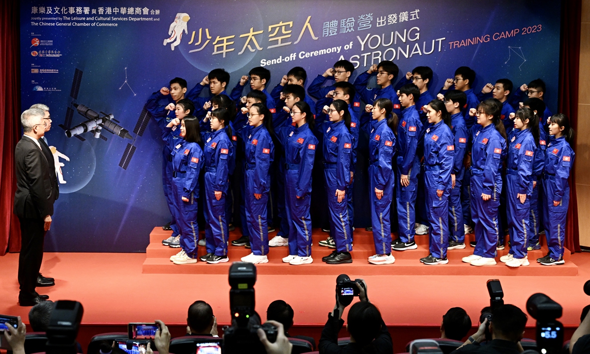 Thirty middle school students from Hong Kong attend the departure ceremony for a 