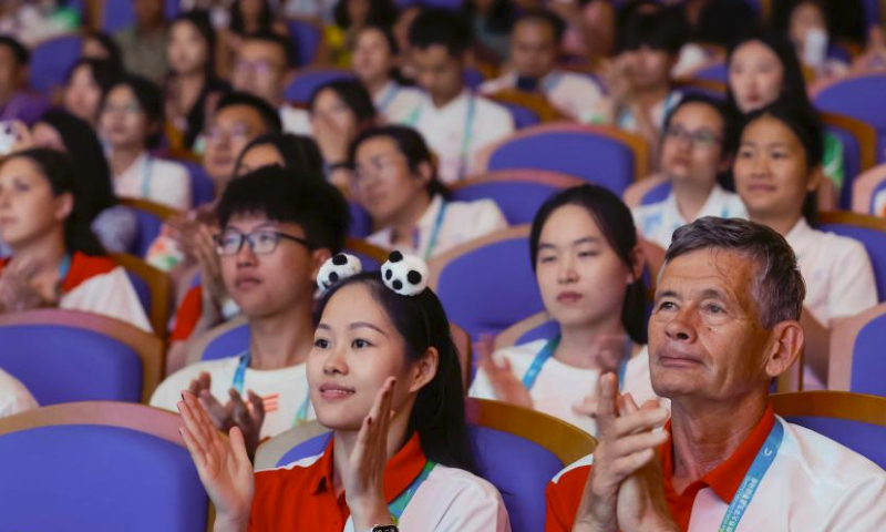 Audience watch the performance during the concert Dreams of Midsummer at the 31st FISU Summer World University Games Village in Chengdu, southwest China's Sichuan Province, July 30, 2023. (Xinhua/Shen Bohan)