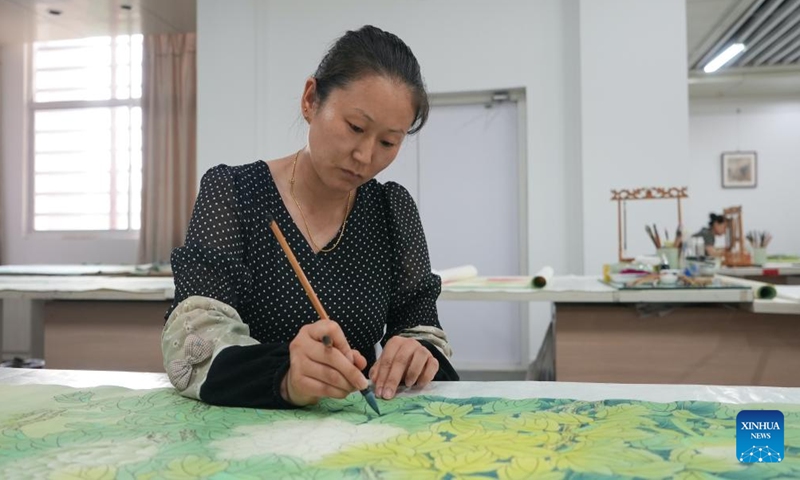 Workers paint at a workshop in Juye County, Heze City of east China's Shandong Province, July 24, 2023.
There are over 20,000 people involved in the calligraphy and painting industry in the county, creating more than 1.2 million works every year. The works are exported to more than 40 countries and regions. (Xinhua/Wu Feizuo)