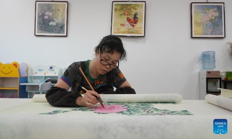 A worker paints at a workshop in Juye County, Heze City of east China's Shandong Province, July 24, 2023.
There are over 20,000 people involved in the calligraphy and painting industry in the county, creating more than 1.2 million works every year. The works are exported to more than 40 countries and regions. (Xinhua/Wu Feizuo)