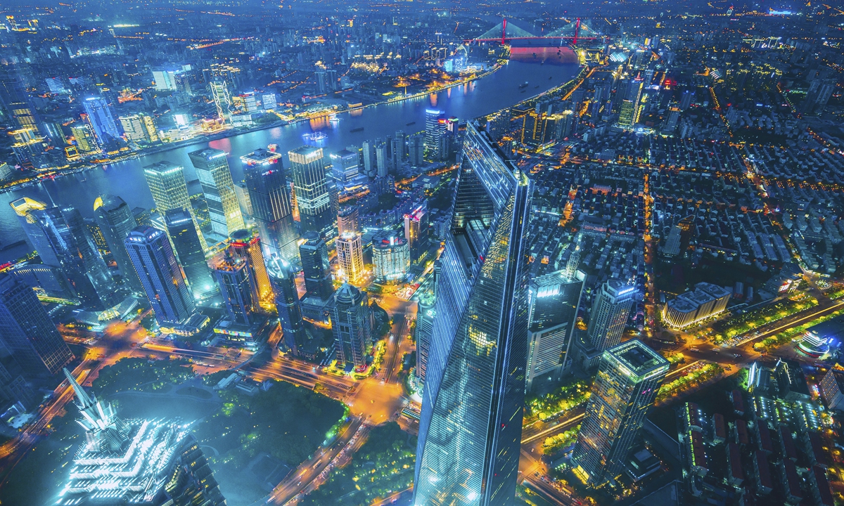 An aerial view of Shanghai, East China, at night Photo: VCG
