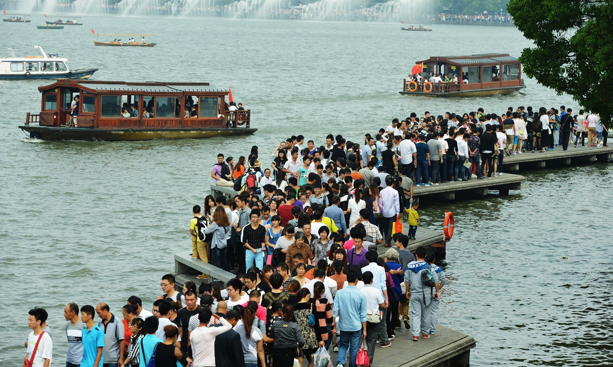 People visit West Lake in Hangzhou, East China's Zhejiang Province. Photo: IC