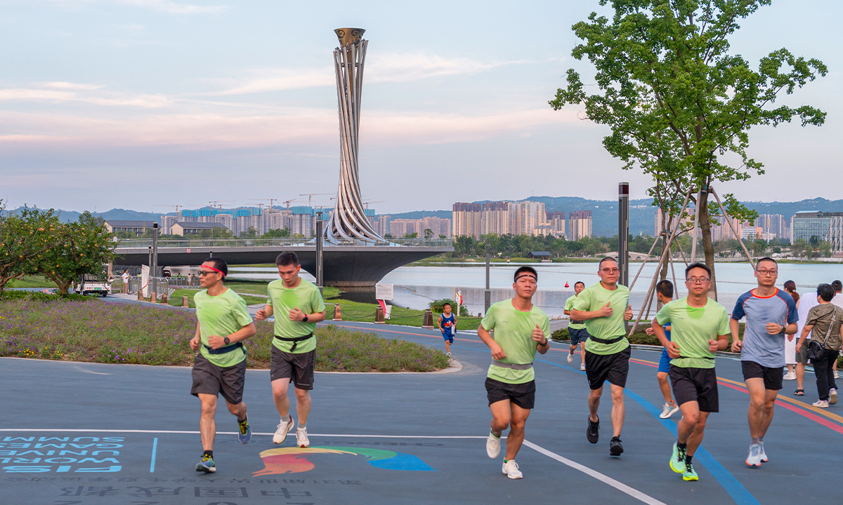 Chengdu citizens exercise near Dong'an Lake Sports Park. Photo: VCG