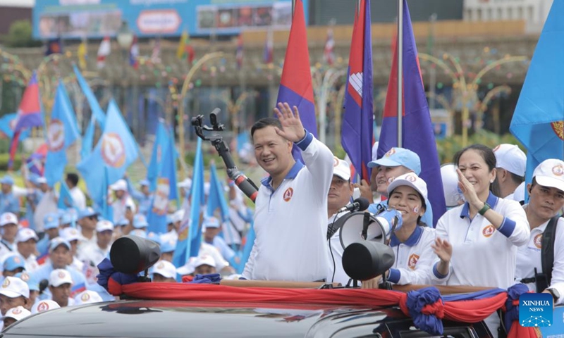 Hun Manet, the future prime minister candidate for the Cambodian People's Party (CPP), waves to supporters during a massive rally in Phnom Penh, Cambodia on July 21, 2023. (Photo:Xinhua)