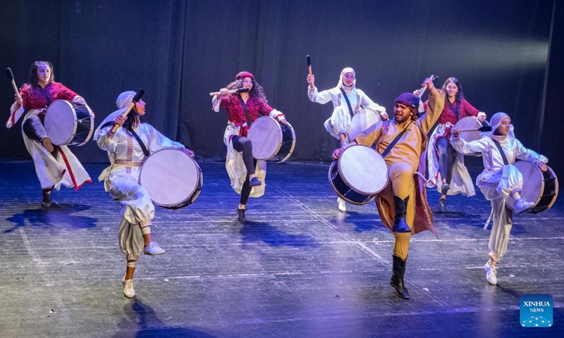 Dancers perform traditional dance Dabke during an Arabic cultural gala at a theater in East Jerusalem, on Aug. 6, 2023.(Photo: Xinhua)
