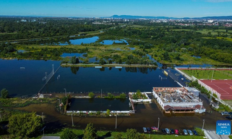 This aerial photo taken on Aug. 7, 2023 shows a flooded football court as River Sava overflows because of heavy rainfall at Ivanja Reka in Zagreb, Croatia.(Photo: Xinhua)