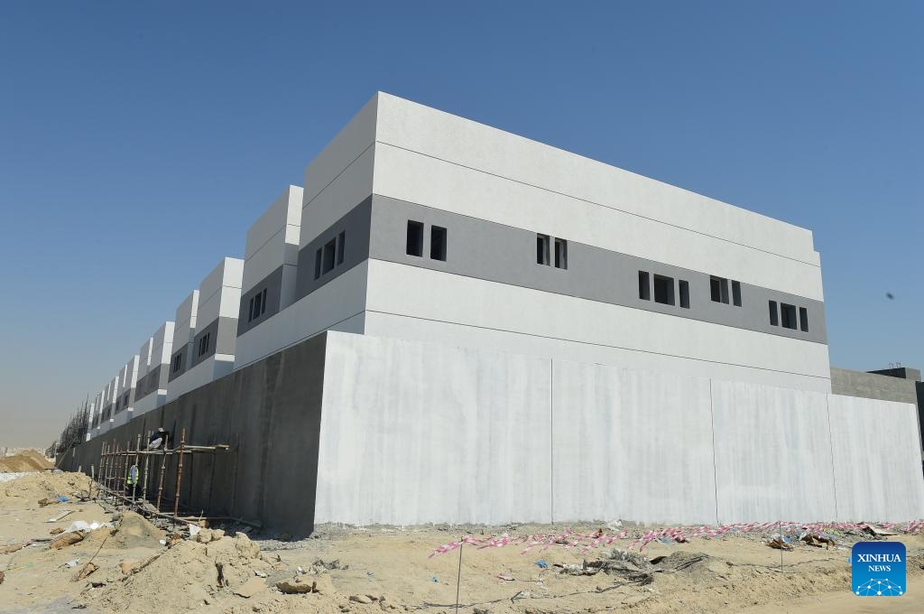 Workers work at the construction site of a housing project undertaken by Chinese enterprises in Ahmadi Governorate, Kuwait, Aug. 6, 2023. The housing project, jointly constructed by Power Construction Corporation Of China (PowerChina) and China Railway Group Limited (CREC), is located in Ahmadi Governorate.(Photo: Xinhua)