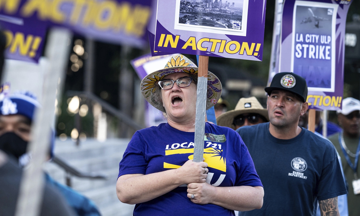 Los Angeles city employees with SEIU Local 721 protest outside City Hall in Los Angeles on August 8, 2023. Thousands of employees, including sanitation workers, engineers and traffic officers, walked off the job for a 24-hour strike alleging unfair labor practices. The walk-out is the first major city worker strike in at least 15 years. Photo: AFP