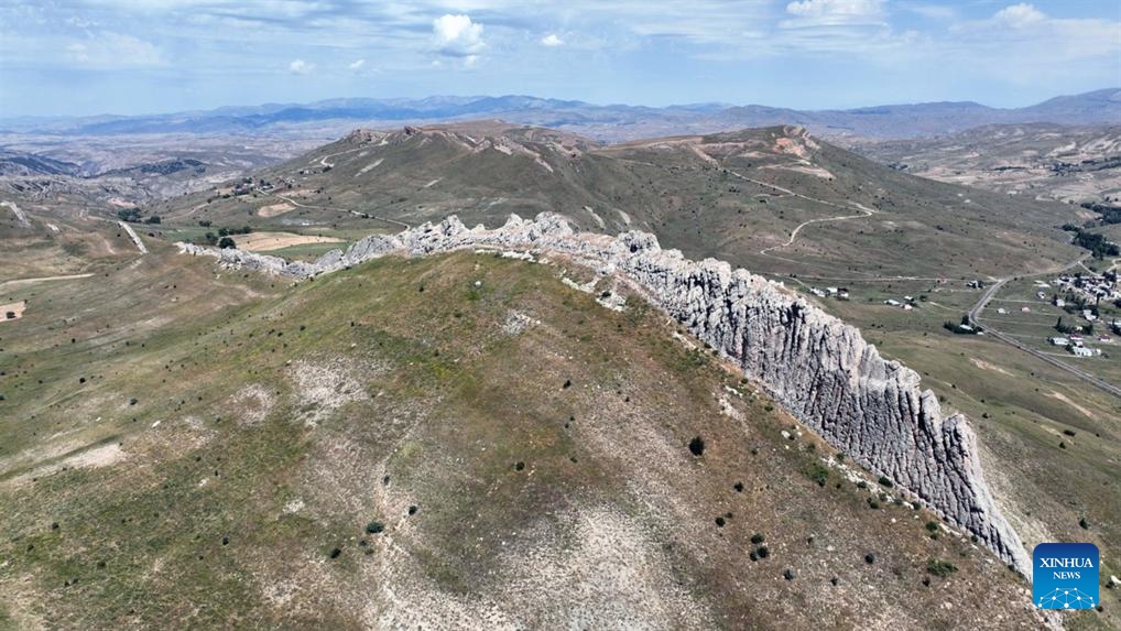 This aerial photo taken on Aug. 2, 2023 shows a view of the Dis Cliffs (Tooth Cliffs) in Sivas, central Türkiye.(Photo: Xinhua)