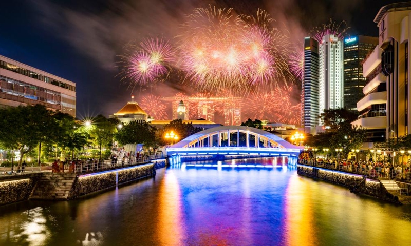 Fireworks light up the sky during the National Day Parade at Singapore's Padang on Aug. 9, 2023. Singapore held a National Day Parade on Wednesday to celebrate its 58th anniversary at Padang, an open playing field near the iconic Marina Bay, with a military show, performances and fireworks.(Photo: Xinhua)
