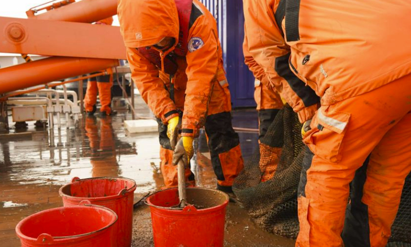 Members of China's 13th Arctic Ocean scientific expedition team collect samples retrieved after a trawl operation aboard China's polar icebreaker Xuelong 2, Aug. 4, 2023.

With the completion of a seawater sample collection operation, the main tasks of the first phase of China's 13th Arctic Ocean scientific expedition have all been completed.

The expedition, organized by the Ministry of Natural Resources, is intended to conduct investigations into the geology and geophysics of the mid-ocean ridge, as well as atmospheric, sea ice, marine and subsurface environmental surveys, and surveys of biomes and pollutants. (Xinhua/Wei Hongyi)