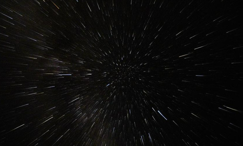 A Perseid meteor shower is pictured over Turkish resort city of Antalya on Aug. 12, 2023. (Mustafa Kaya/Handout via Xinhua)