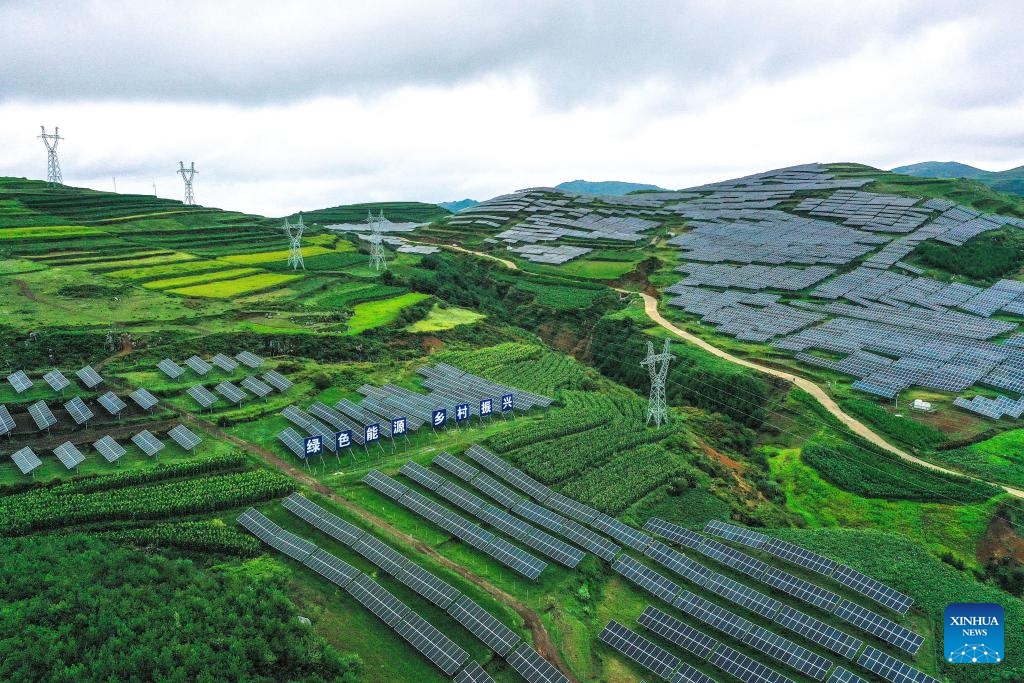 This aerial photo taken on July 20, 2023 shows a photovoltaic power plant in Yi-Hui-Miao Autonomous County of Weining, southwest China's Guizhou Province. Guizhou has seized the opportunity and made big stride in the development of new energy industry, such as wind power and photovoltaic power, in recent years. While vigorously developing green energy, Guizhou has also made full use of the land under photovoltaic panels to develop farming and livestock breeding.(Photo: Xinhua)