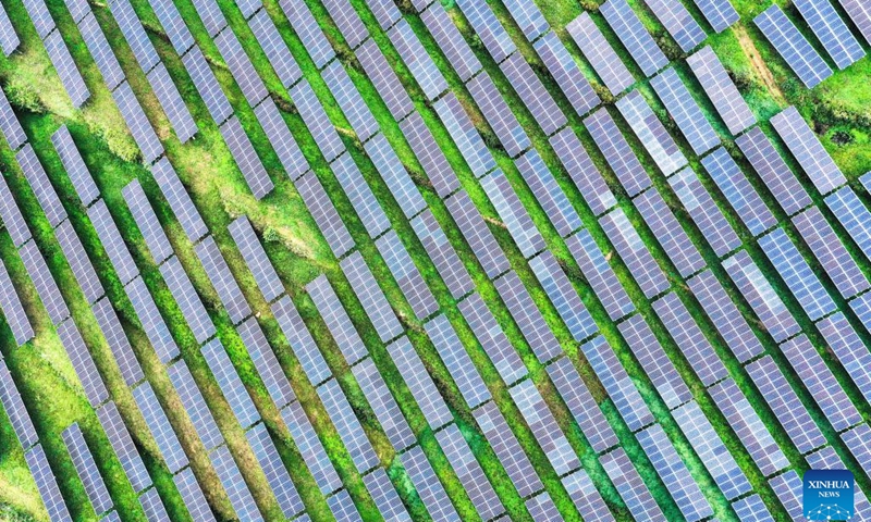This aerial photo taken on July 20, 2023 shows a photovoltaic power plant in Yi-Hui-Miao Autonomous County of Weining, southwest China's Guizhou Province. Guizhou has seized the opportunity and made big stride in the development of new energy industry, such as wind power and photovoltaic power, in recent years. While vigorously developing green energy, Guizhou has also made full use of the land under photovoltaic panels to develop farming and livestock breeding.(Photo: Xinhua)