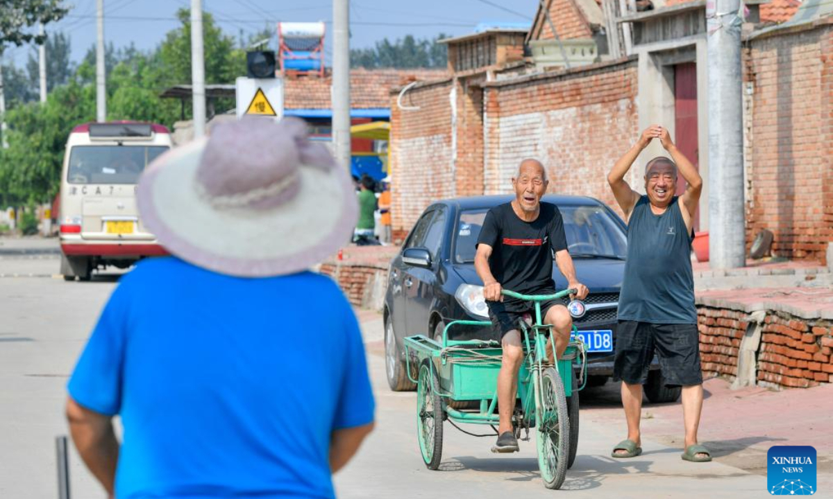 Villagers return home in Shaoqidi Village of Huanghuadian Township, Wuqing District, north China's Tianjin, Aug 17, 2023. Photo:Xinhua