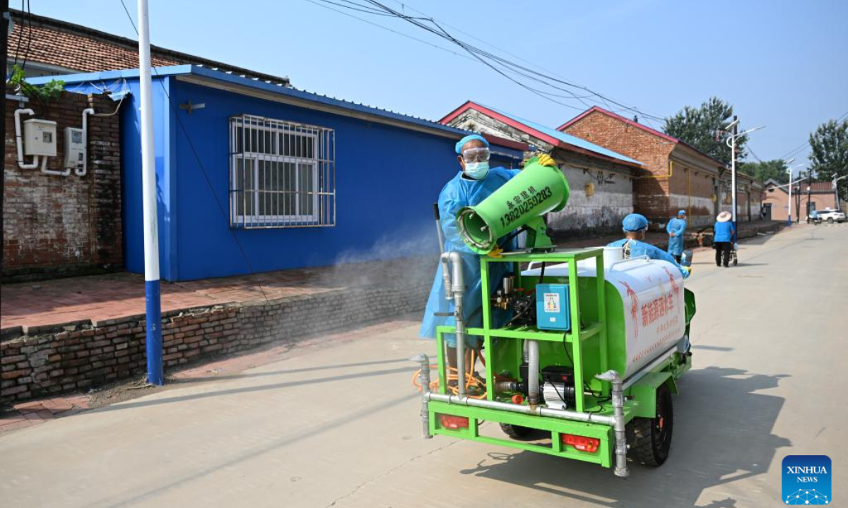 A worker carries out disinfection operations in Shaoqidi Village of Huanghuadian Township, Wuqing District, north China's Tianjin, Aug 17, 2023. Photo:Xinhua