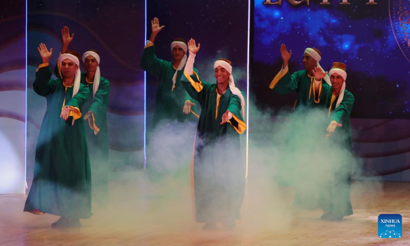 Artists perform at the opening ceremony of Ismailia International Folklore Festival in Ismailia, Egypt, Sept. 3, 2023. Twenty troupes from seven countries show their unique folklore cultural performances during the six-day festival that kicked off here on Sunday evening. (Xinhua/Ahmed Gomaa)