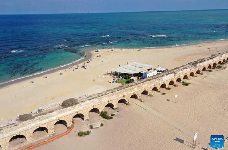 This aerial photo taken on Aug. 20, 2023 shows a view of the Roman aqueduct system on a beach in Caesarea, Israel. An ancient arch structure in Caesarea's famous ancient Roman aqueduct system collapsed on a beach early Friday morning. Israel Antiquities Authority said the section that collapsed was built in the time of Emperor Hadrian, some 1900 years ago. Photo: Xinhua