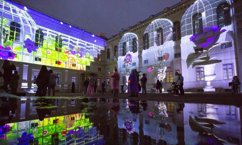 People visit a light show at the Gatchina Palace and Estate Museum near St. Petersburg, Russia, Aug. 19, 2023. The Gatchina Palace and Estate Museum hosted an international light art festival from Aug. 17 to Aug. 19, attracting multimedia professionals from various countries to demonstrate their artworks. Photo: Xinhua