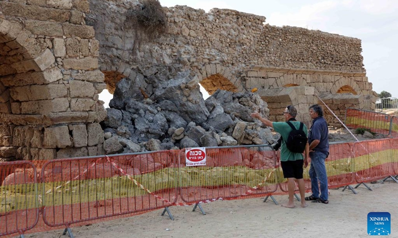 This photo taken on Aug. 20, 2023 shows the collapsed arch of the Roman aqueduct system on a beach in Caesarea, Israel. An ancient arch structure in Caesarea's famous ancient Roman aqueduct system collapsed on a beach early Friday morning. Israel Antiquities Authority said the section that collapsed was built in the time of Emperor Hadrian, some 1900 years ago. Photo: Xinhua