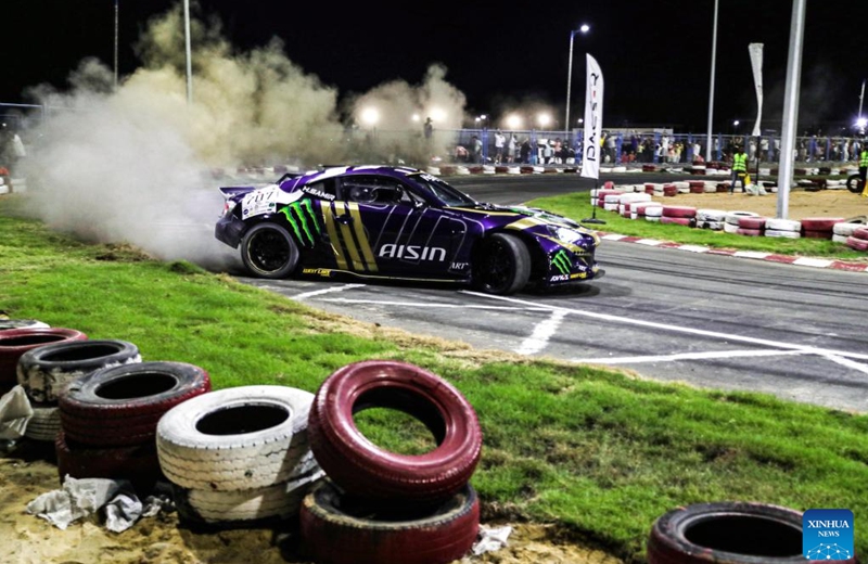A competitor performs during the drift challenge of Misr International Motorsport Championship in New Alamein City, Egypt, Aug. 19, 2023. (Xinhua/Ahmed Gomaa)